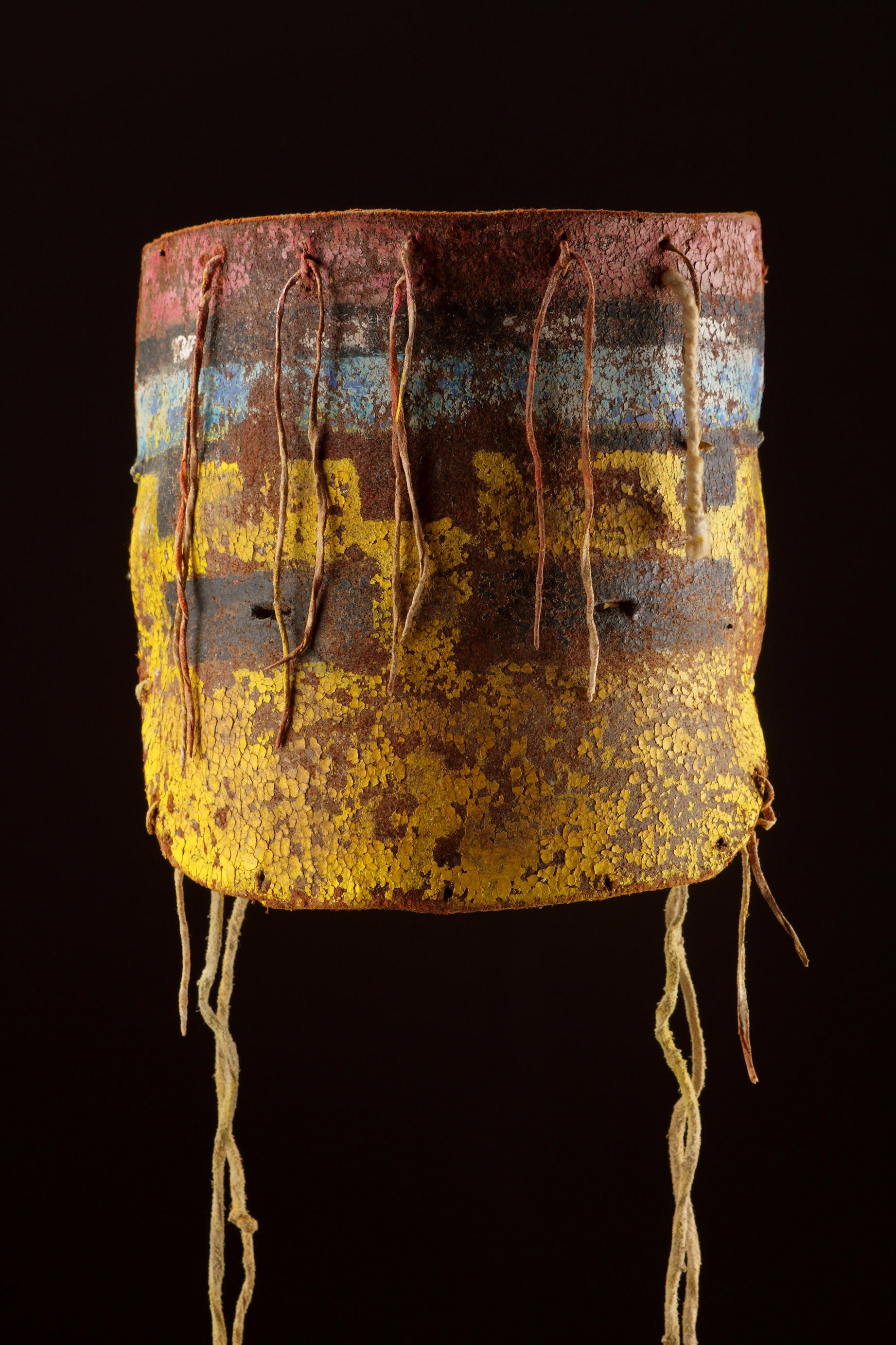 Hopi Kachina dance mask of painted shaped leather with sinew attachments probably representing ‘Kana’